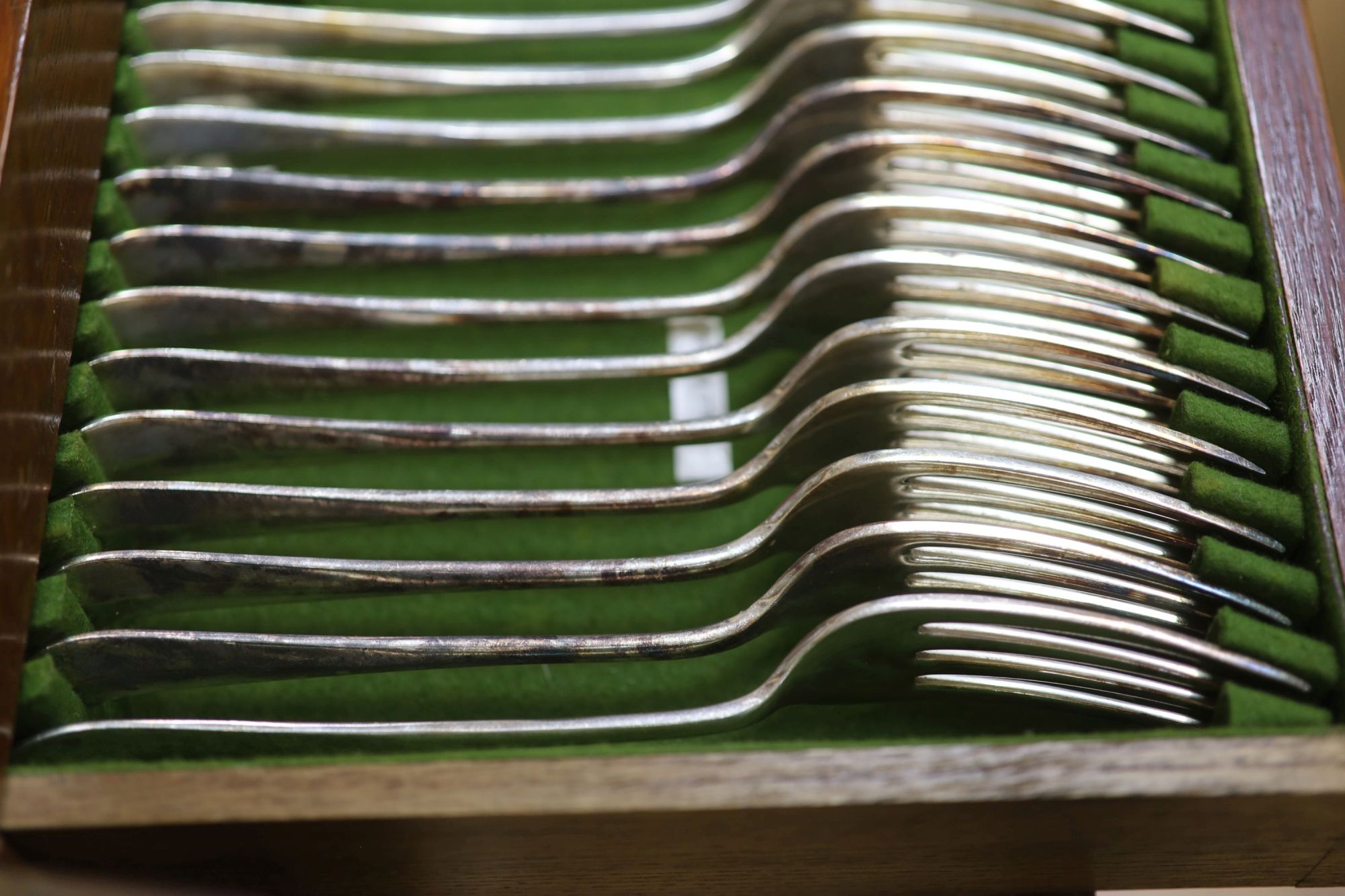 A mahogany cased canteen of silver-plated cutlery